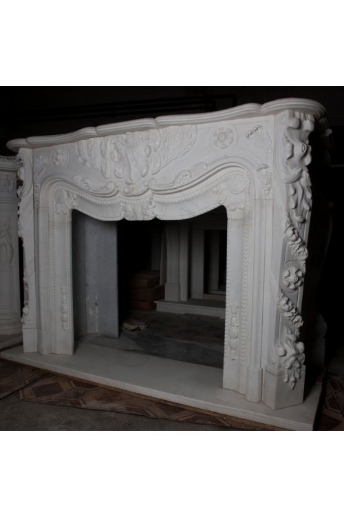 Камін 0312 Портал для каміна з білого мармуру з різьбленням у французькому стилі